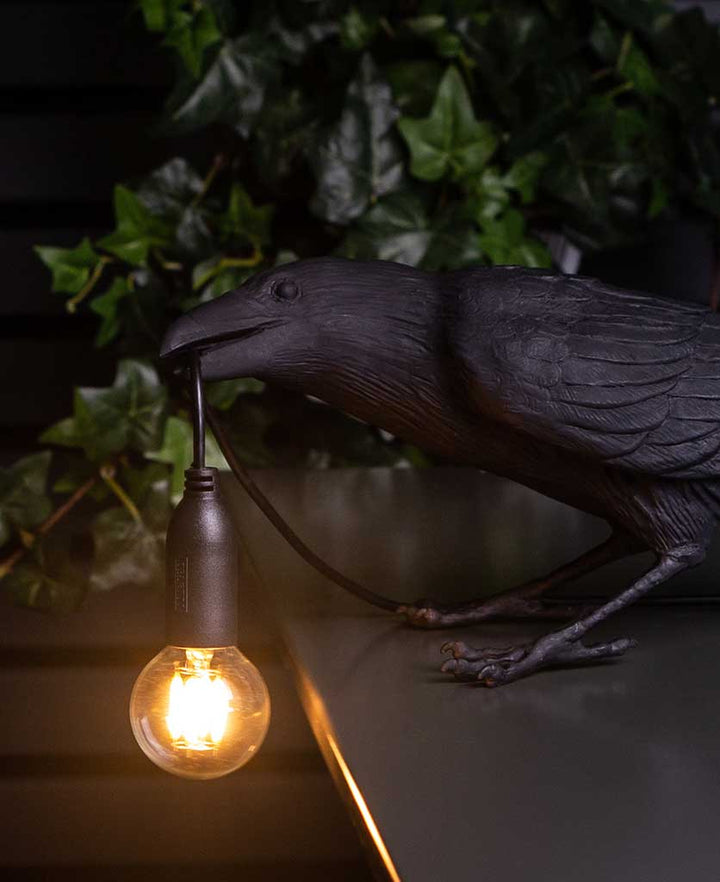 Front View of the Raven Lamp with a Textured Glass Shade