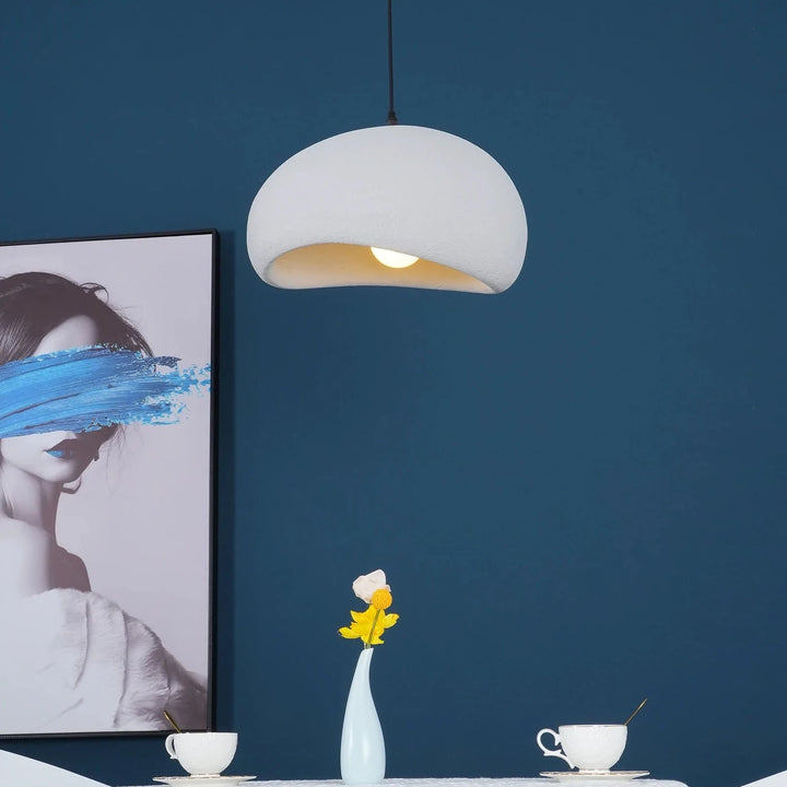 Nula Cloud pendant light in showroom, highlighting products in a soft light