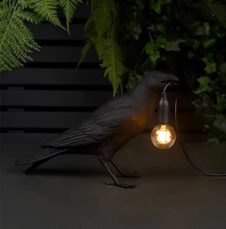 Raven Lamp Creating a Dramatic Effect in a Minimalist Interior