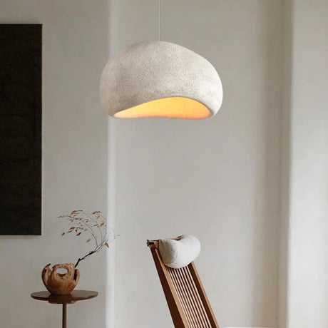 Nula Cloud pendant light in bedroom, casting a warm glow