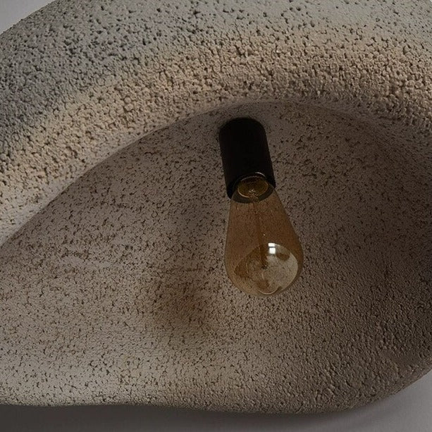 Nula Cloud pendant light in greenhouse, providing soft and natural lighting for plants.
