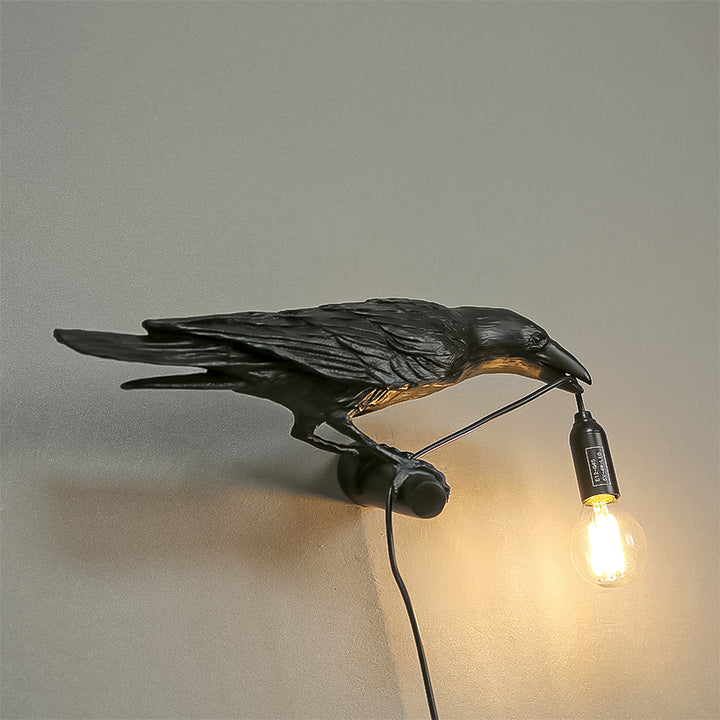A photo of the Raven Lamp in a cozy living room,